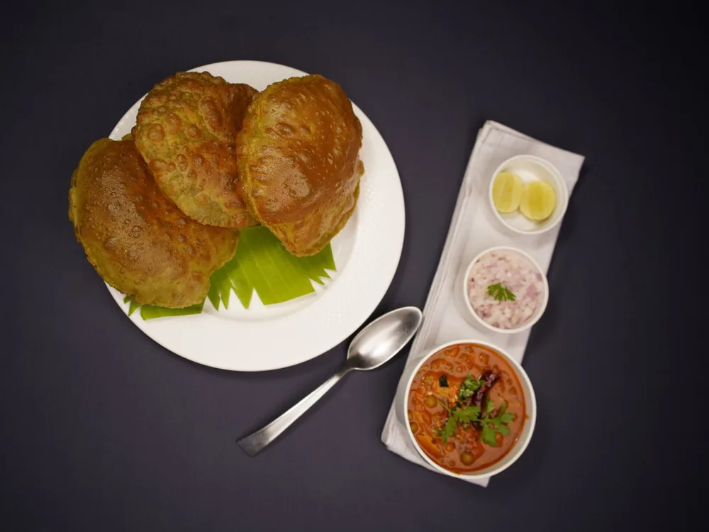 Chole Bhature — Dark, sour and unapologetic